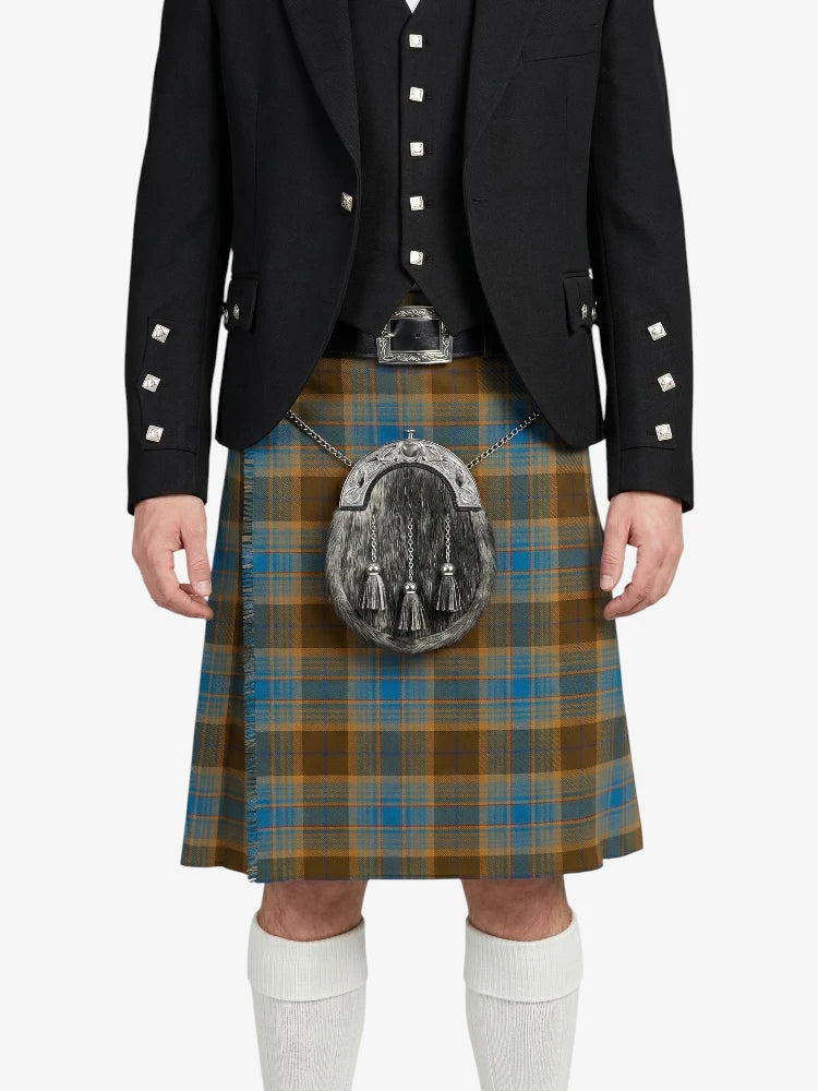 Person wearing a traditional Scottish kilt with a tartan pattern on a white background