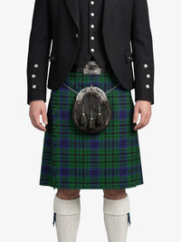 Person wearing a traditional Scottish kilt with a sporran on a white background