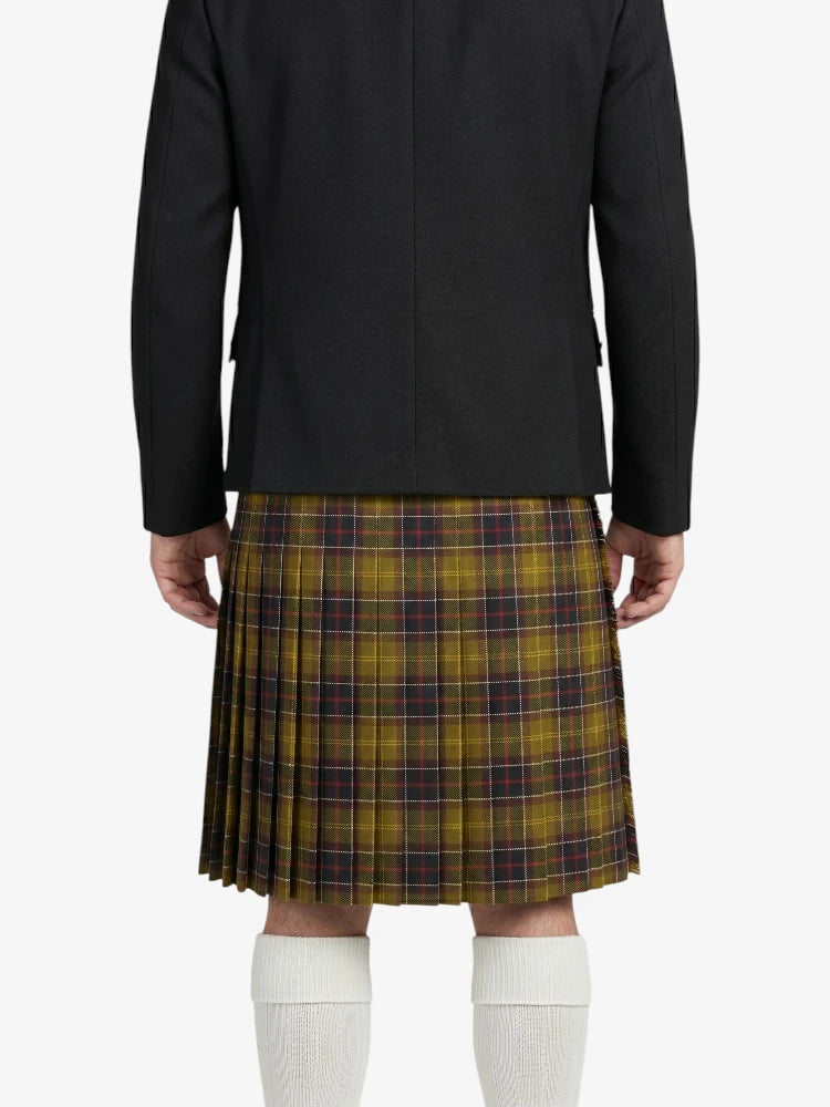 Person wearing a black jacket and plaid kilt on a white background
