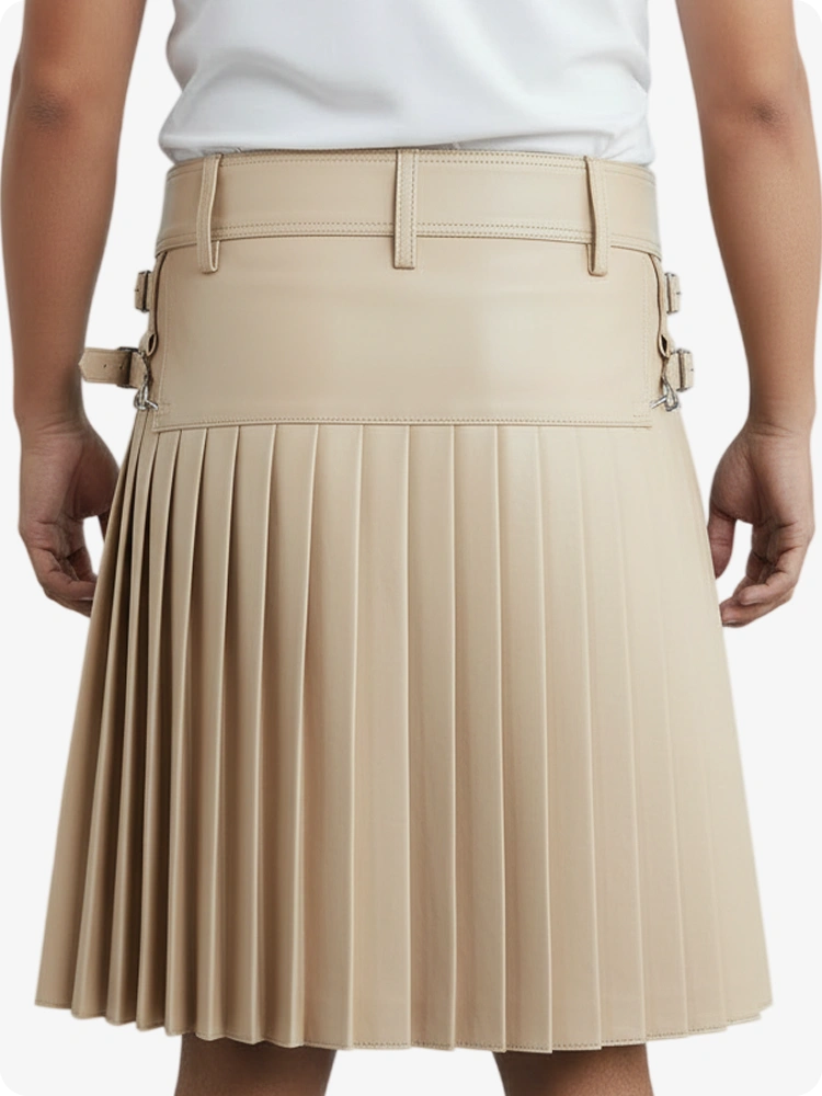 Beige pleated skirt worn by a person on a white background