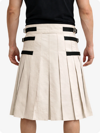 Beige kilt with black accents worn by a person on a white background