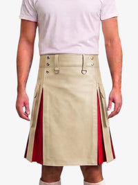 A beige faux-leather kilt with red side panels and silver buckle details, worn by a model in a light pink t-shirt against a white background.