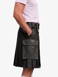 A person wearing a black leather pleated kilt with a large front flap pocket, shown from the side against a plain light background.