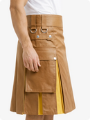 Brown kilt with yellow accents worn by a person on a white background
