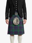 Person wearing a black jacket and green plaid kilt with a silver sporran on a white background