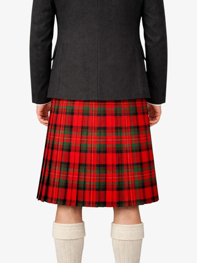 Person wearing a black jacket and red plaid kilt on a white background