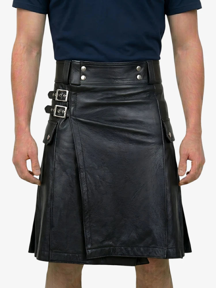Black leather kilt with silver buckles on a plain background