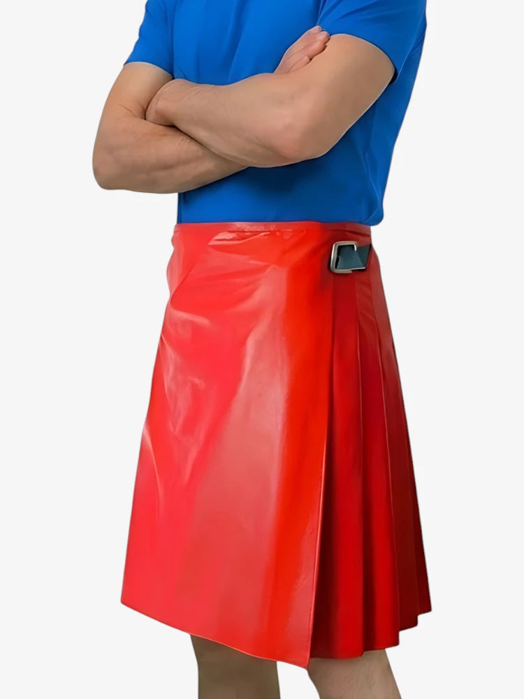 Person wearing a blue shirt and red pleated skirt on a white background