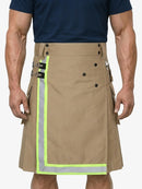 Person wearing a tan kilt with reflective green trim on a white background