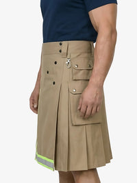Person wearing a beige kilt with multiple pockets on a white background