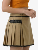 Beige pleated skirt with black lace trim and belt on a white background