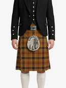 Person wearing a traditional Scottish kilt with a black jacket on a white background