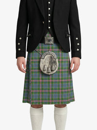Person wearing a black jacket and green plaid kilt with a white background