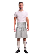 A man modeling a gray faux-leather kilt costume with a matching waist bag and tassel, worn over a light pink t-shirt, cream knee-high socks, and black lace-up shoes, on a white background.