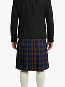 Person wearing a black jacket and blue plaid kilt on a white background