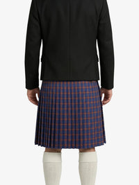 Person wearing a black coat and plaid skirt on a white background