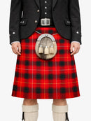 Person wearing a red tartan kilt with a black jacket and white knee-high socks on a white background
