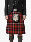Person wearing a black jacket, red plaid kilt, and gray knee-high socks on a white background