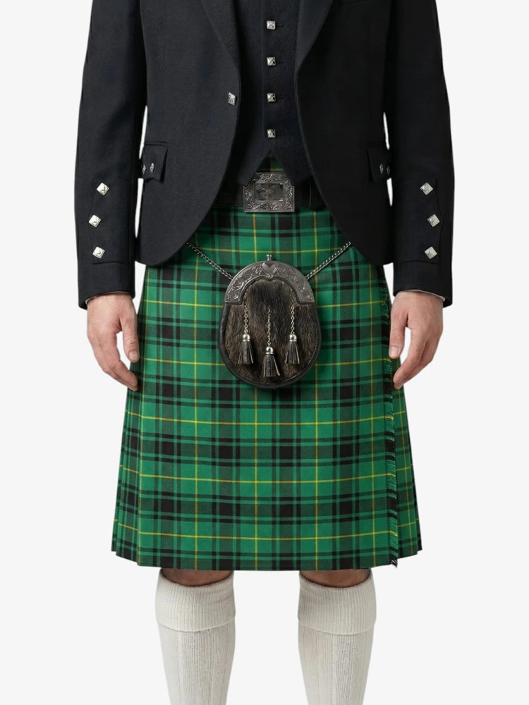 Person wearing a green plaid kilt with a black jacket on a white background