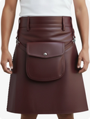 Brown leather skirt with a front pocket on a white background