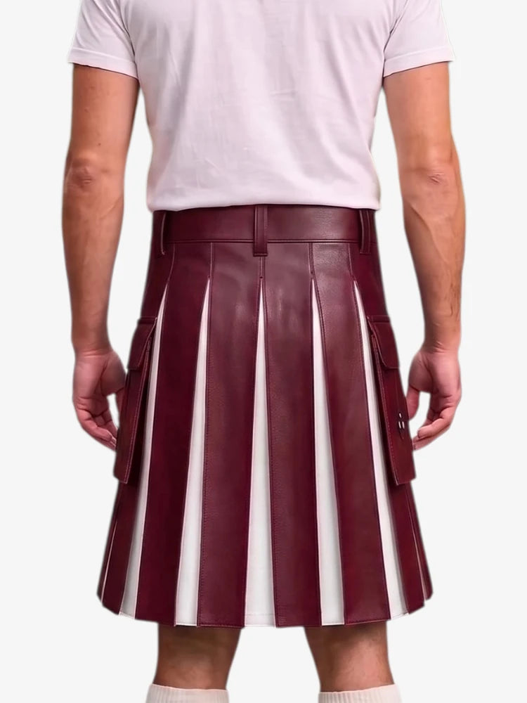 A person shown from the back wearing a pleated leather kilt with vertical burgundy and white stripes, paired with a light pink t-shirt and white socks, against a plain light gray background.