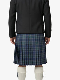 Person wearing a black coat and blue plaid kilt on a white background