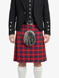 Person wearing a red tartan kilt with a black jacket on a white background