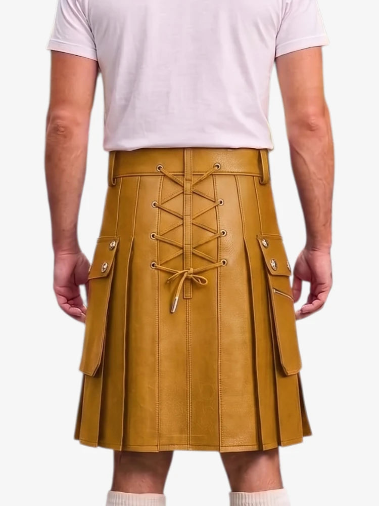 A mustard yellow faux-leather kilt with a lace-up front and side cargo pockets, shown on a model from the back wearing a light pink t-shirt.