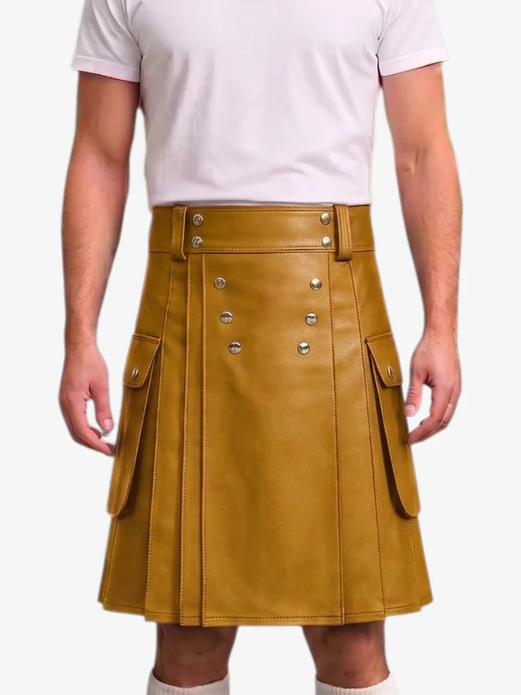 A mustard yellow faux-leather kilt with silver-tone double-breasted buttons and side flap pockets, shown on a model wearing a white t-shirt against a light gray background.