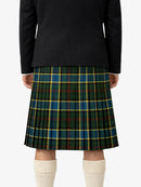 Person wearing a black jacket and green plaid kilt on a white background