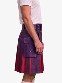 A person wearing a purple leather kilt with red pleated inserts, paired with a white t-shirt and white socks, shown from the side against a light gray background.