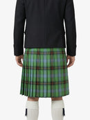 Person wearing a black jacket and green plaid kilt on a white background