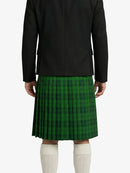Person wearing a black jacket and green plaid kilt on a white background