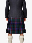 Person wearing a dark jacket and plaid kilt on a white background