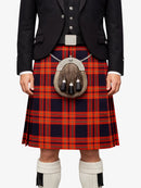 Person wearing a black jacket, red plaid kilt, and white knee-high socks on a white background
