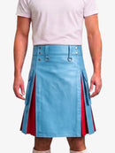 A model wearing a light blue faux leather kilt with red pleated side panels and silver metal hardware, paired with a light pink t-shirt.