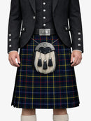Person wearing a traditional Scottish kilt with a sporran on a white background