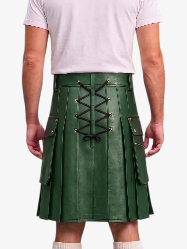 A person shown from the back wearing a dark green faux-leather kilt with a central lace-up closure and side flap pockets, paired with a light pink t-shirt and white socks against a plain white background.