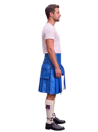 A man shown in profile wearing a bright blue leather kilt, a white t-shirt, white knee-high socks, and black leather shoes, set against a solid white background.