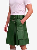 A green faux-leather kilt with a matching belt, silver-tone hardware, and large cargo pockets, shown on a model wearing a white t-shirt against a light gray background.