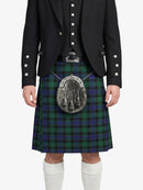 Person wearing a black jacket and green plaid kilt with a sporran on a white background