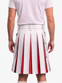 A model shown from the back wearing a pleated white kilt with red vertical stripes and side cargo pockets, paired with a light pink t-shirt.