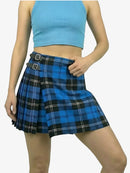 Person wearing a blue plaid skirt and light blue top on a white background